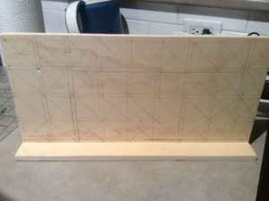 Board is scored with pencil lines diagonally